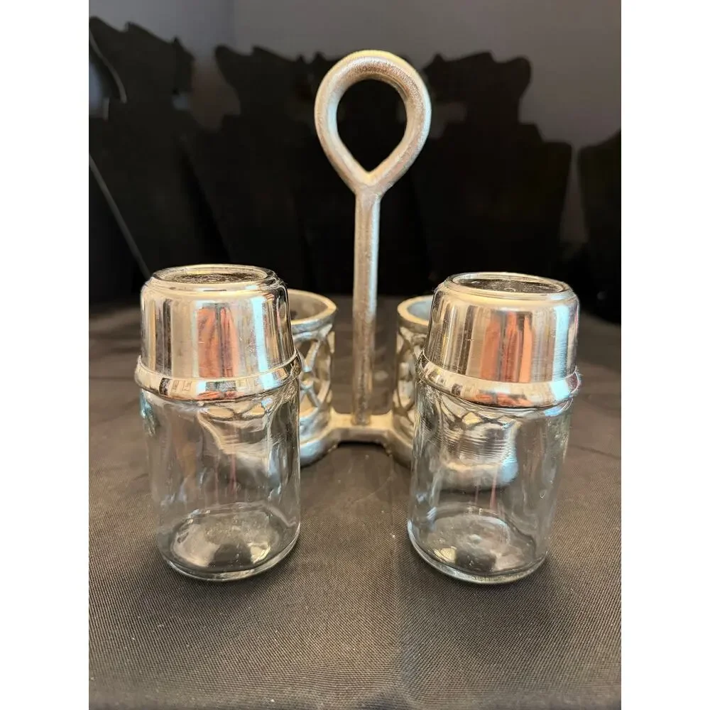 Vintage Pewter cutwork glass and pewter salt and pepper caddy openwork design